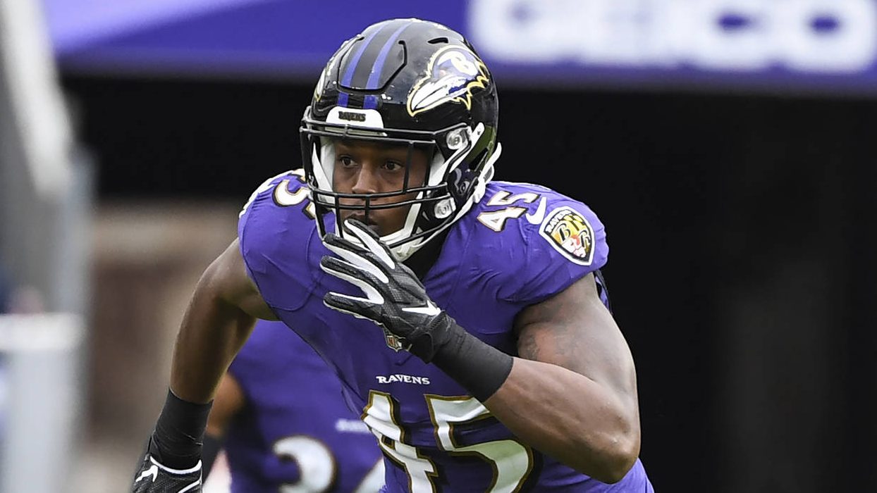 Baltimore Ravens linebacker Jaylon Ferguson plays during the first half of an NFL football game aga...