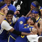 The Golden State Warriors celebrate after beating the Boston Celtics in Game 6 to win basketball's NBA Finals championship, Thursday, June 16, 2022, in Boston. (AP Photo/Michael Dwyer)
