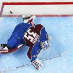 Colorado Avalanche goaltender Darcy Kuemper gives up a goal to the Tampa Bay Lightning during the second period of Game 1 of the NHL hockey Stanley Cup Final on Wednesday, June 15, 2022, in Denver. (AP Photo/John Locher)
