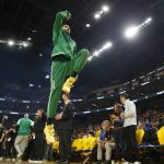 Boston Celtics forward Jayson Tatum warms up before Game 5 of basketball's NBA Finals against the Golden State Warriors in San Francisco, Monday, June 13, 2022. (AP Photo/Jed Jacobsohn)