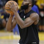 Boston Celtics guard Jaylen Brown warms up before Game 5 of basketball's NBA Finals against the Golden State Warriors in San Francisco, Monday, June 13, 2022. (AP Photo/John Hefti)
