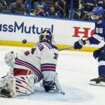 New York Rangers goaltender Igor Shesterkin (31) makes the save against Tampa Bay Lightning right wing Nikita Kucherov (86) during the second period in Game 6 of the NHL hockey Stanley Cup playoffs Eastern Conference finals, Saturday, June 11, 2022, in Tampa, Fla. (AP Photo/Chris O'Meara)