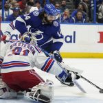 Tampa Bay Lightning left wing Pat Maroon (14) tries to score against New York Rangers goaltender Igor Shesterkin (31) during the second period in Game 6 of the NHL hockey Stanley Cup playoffs Eastern Conference finals, Saturday, June 11, 2022, in Tampa, Fla. (AP Photo/Chris O'Meara)