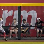 Cincinnati Reds' TJ Friedl (29) fields a double hit by Arizona Diamondbacks' Daulton Varsho during the fifth inning of a baseball game, Wednesday, June 15, 2022, in Phoenix. (AP Photo/Matt York)