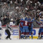 The Colorado Avalanche celebrate a goal against the Tampa Bay Lightning by Gabriel Landeskog during the first period of Game 1 of the NHL hockey Stanley Cup Final on Wednesday, June 15, 2022, in Denver. (AP Photo/John Locher)