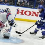 Tampa Bay Lightning center Anthony Cirelli (71) goes in for a shot on New York Rangers goaltender Igor Shesterkin (31) during the second period in Game 6 of the NHL hockey Stanley Cup playoffs Eastern Conference finals, Saturday, June 11, 2022, in Tampa, Fla. (AP Photo/Chris O'Meara)