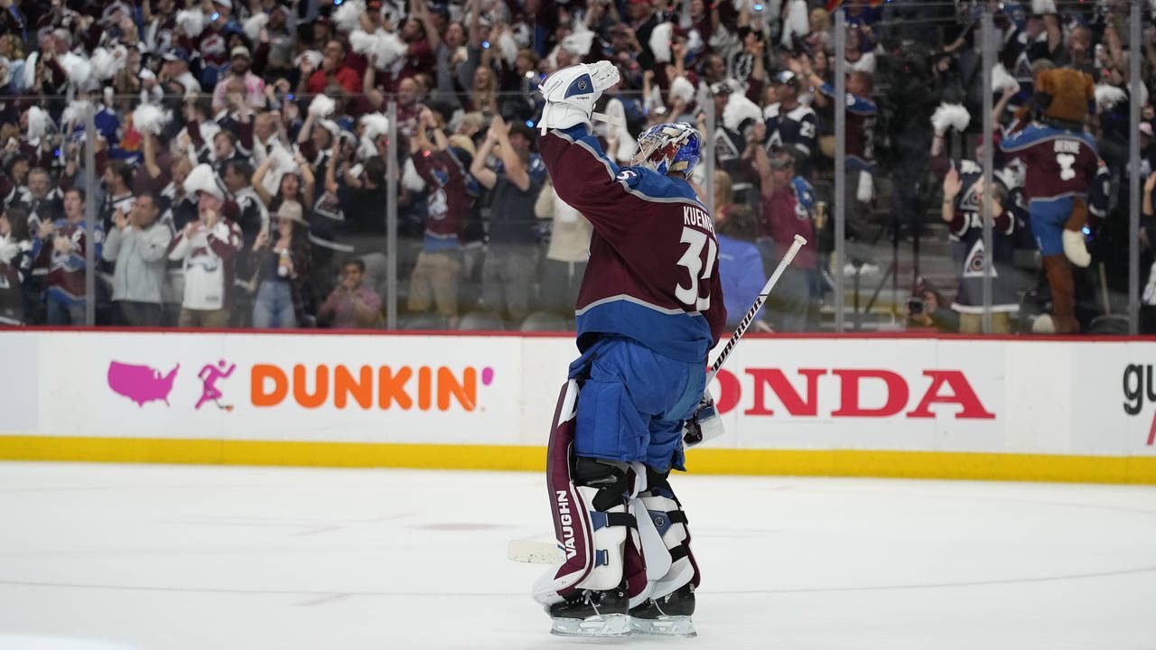 Colorado Avalanche goaltender Darcy Kuemper celebrates after the Avalanche defeated the Tampa Bay L...