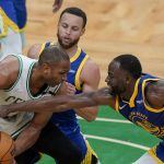 Boston Celtics center Al Horford (42) is double teamed by Golden State Warriors forward Draymond Green (23) and guard Stephen Curry during the third quarter of Game 6 of basketball's NBA Finals, Thursday, June 16, 2022, in Boston. (AP Photo/Steven Senne)