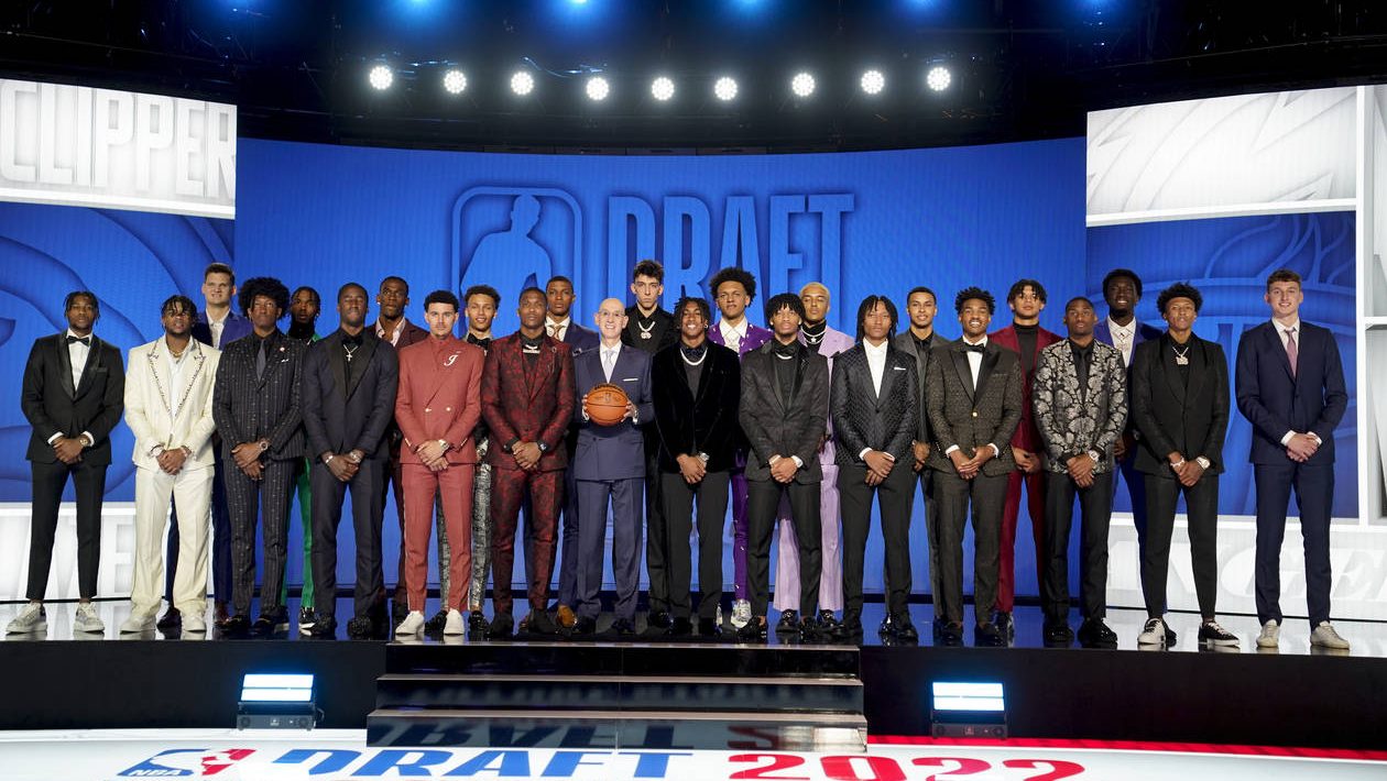 NBA draft prospects pose for a photo with NBA Commissioner Adam Silver, center, before the start of...