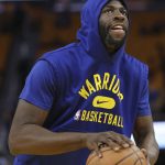 Golden State Warriors forward Draymond Green warms up before Game 5 of basketball's NBA Finals against the Boston Celtics in San Francisco, Monday, June 13, 2022. (AP Photo/Jed Jacobsohn)