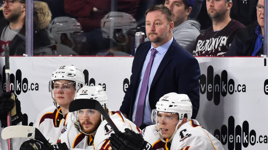 Head coach of the Cleveland Monsters John Madden looks on from behind the bench against the Laval R...