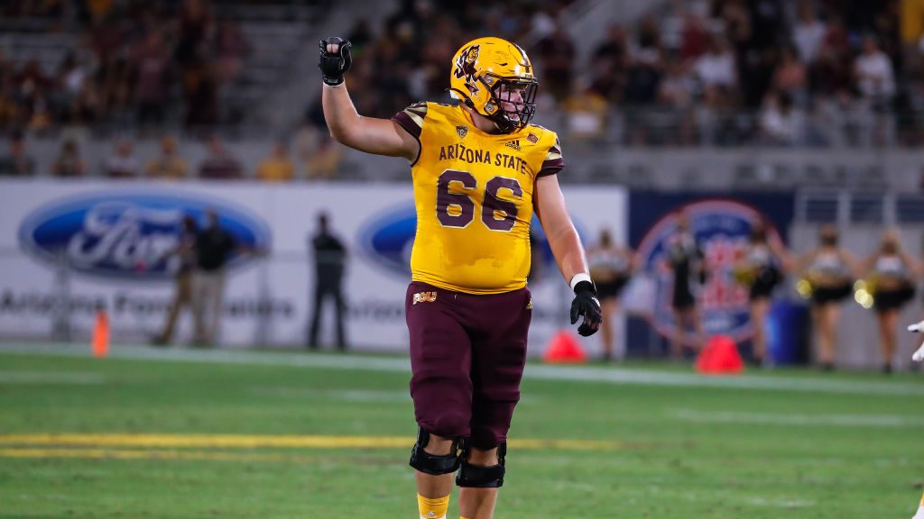 Arizona State Sun Devils offensive lineman Ben Scott (66) looks on during the college football game...