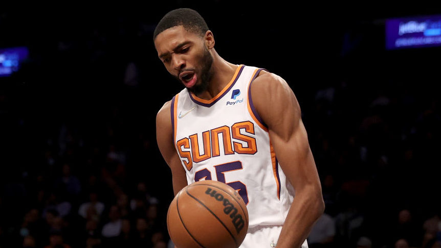 Mikal Bridges #25 of the Phoenix Suns celebrates his dunk in the second quarter against the Brookly...