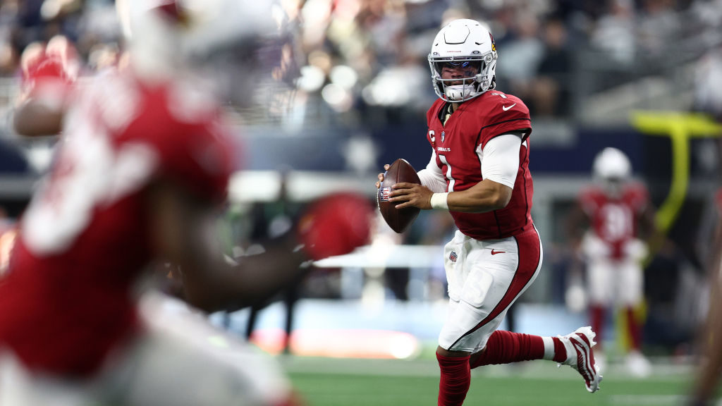 Kyler Murray #1 of the Arizona Cardinals scrambles with the ball while under pressure during the fi...