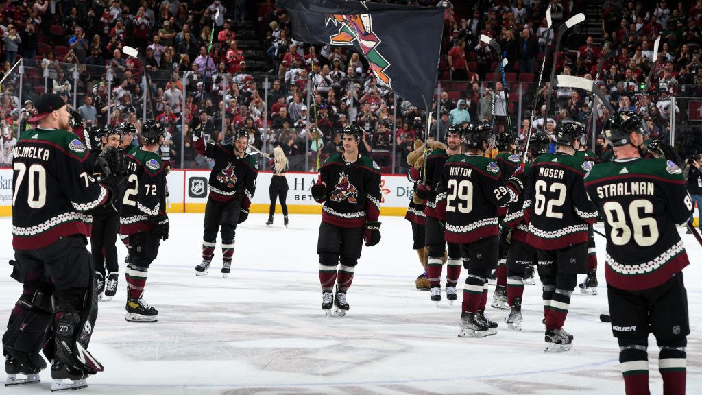 The Arizona Coyotes salutes the crowd after a win against the Nashville Predators at Gila River Are...