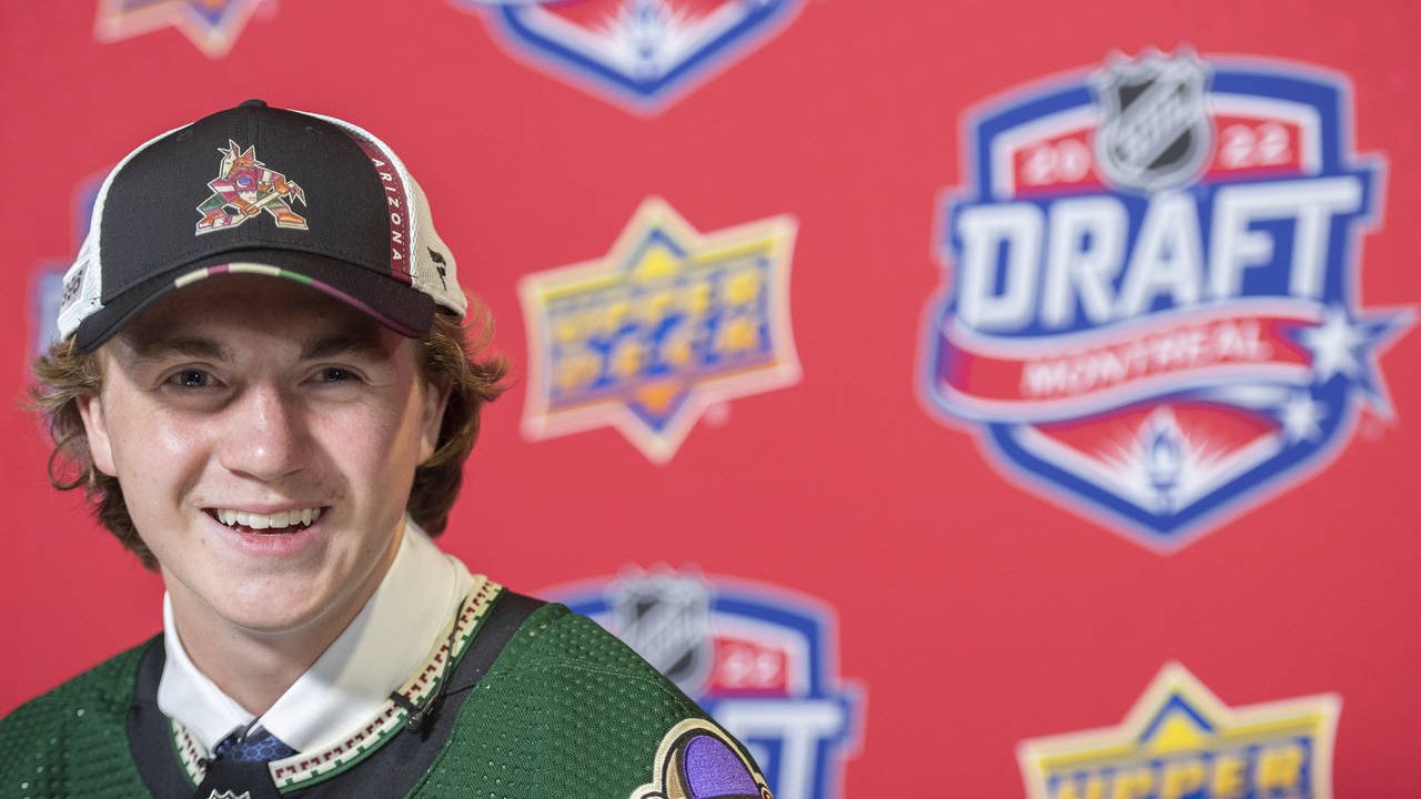 Logan Cooley smiles during a news conference after being selected as the third overall pick by the ...
