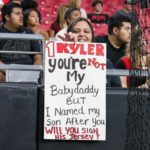 An Arizona Cardinals fan holds up a sign during training camp on Wednesday, Aug. 10, 2022, in Glendale. (Tyler Drake/Arizona Sports)