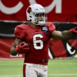 Arizona Cardinals RB James Conner runs through drills during the Red & White practice on Saturday, Aug. 6, 2022, in Glendale. (Tyler Drake/Arizona Sports)