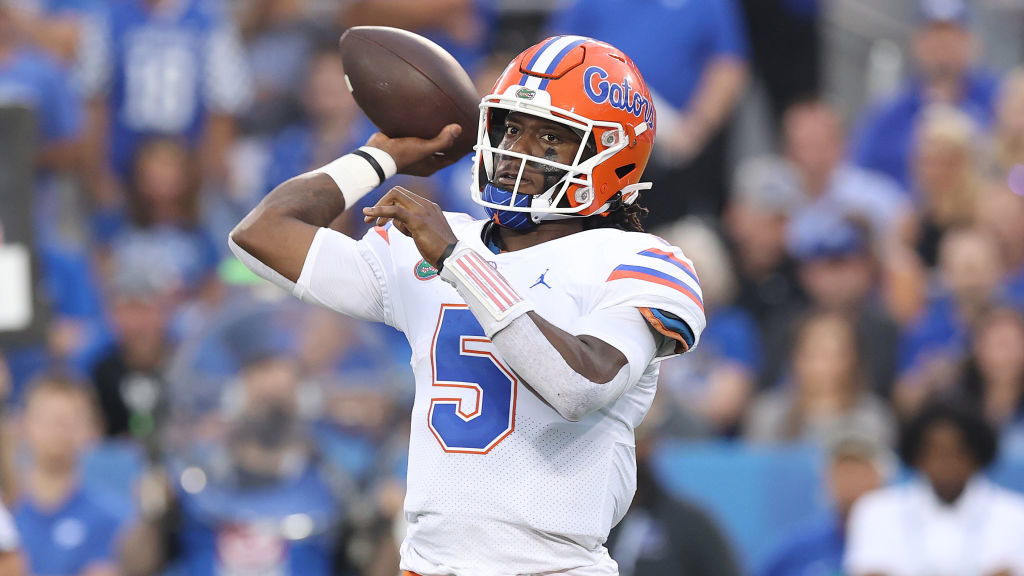Emory Jones #5 of the Florida Gators throws the ball against the Kentucky Wildcats at Kroger Field ...
