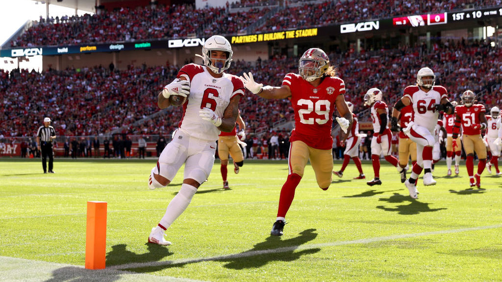 James Conner #6 of the Arizona Cardinals runs the ball for a touchdown during the first quarter aga...
