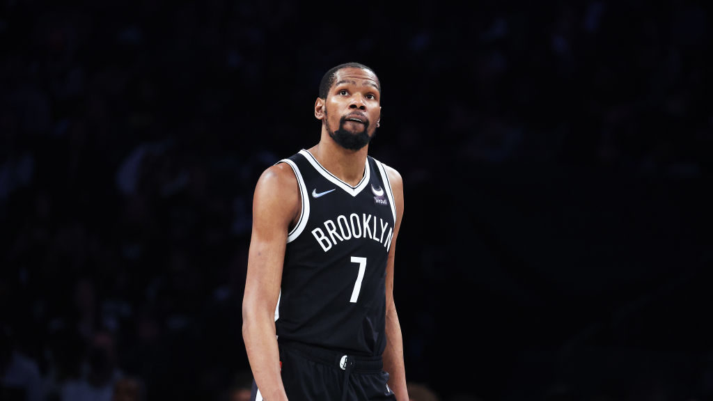 Kevin Durant #7 of the Brooklyn Nets looks on against the Boston Celtics during Game Three of the E...