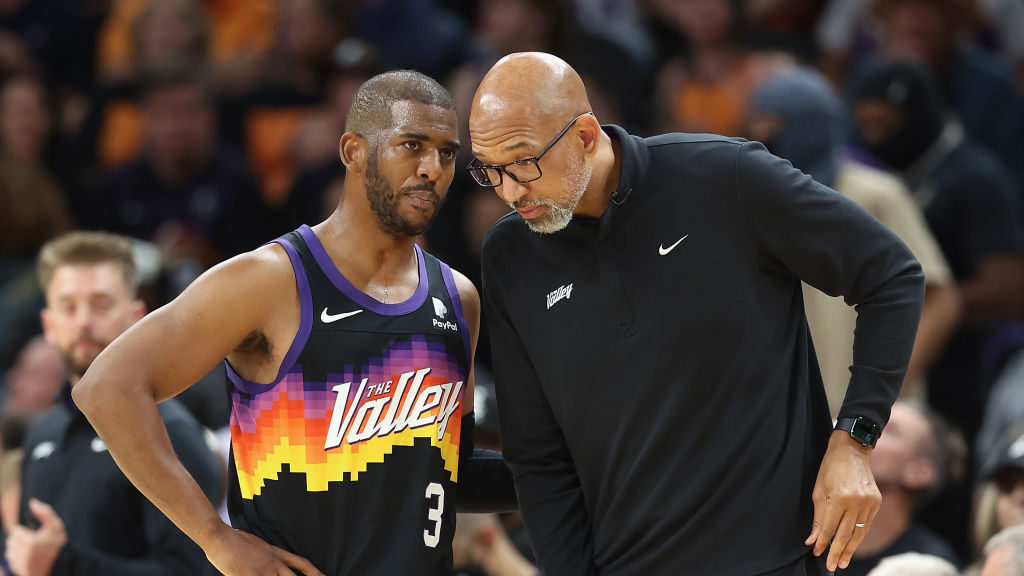 Chris Paul #3 and head coach Monty Williams of the Phoenix Suns talk during the second half of Game...