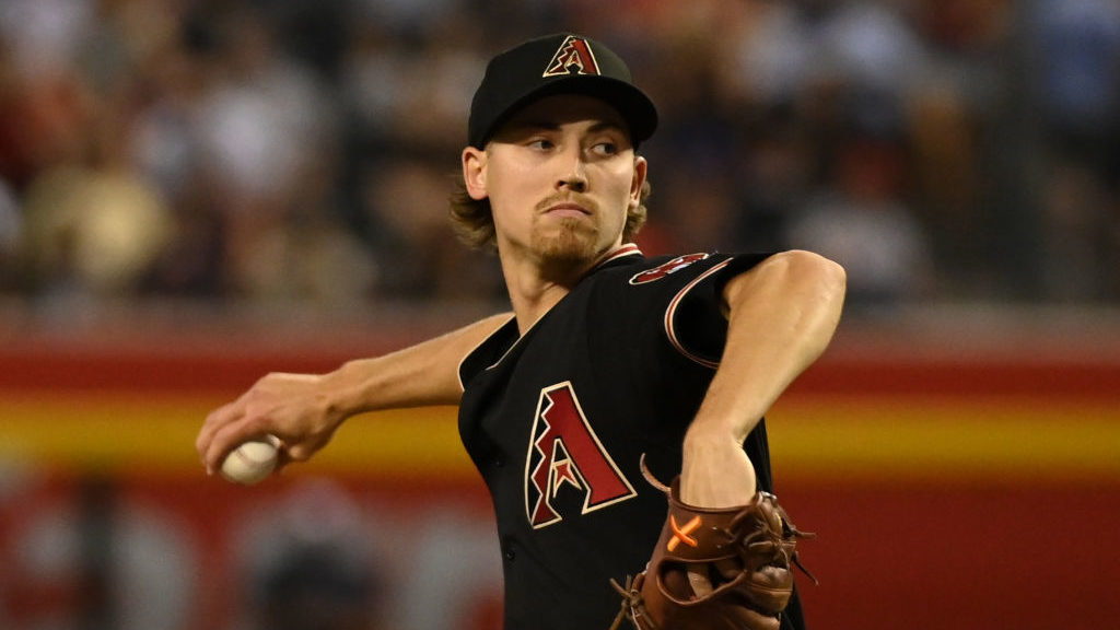 Luke Weaver #7 of the Arizona Diamondbacks delivers a first inning pitch against the Minnesota Twin...