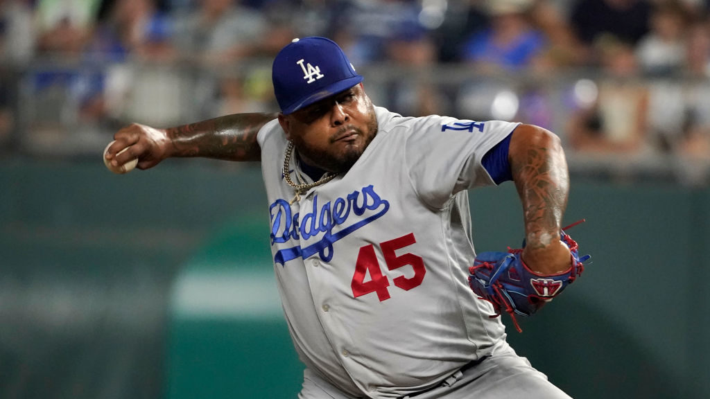 Reyes Moronta #45 of the Los Angeles Dodgers throws in the eighth inning against the Kansas City Ro...