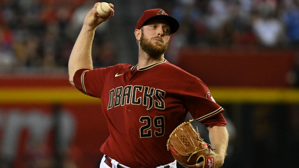 Merrill Kelly #29 of the Arizona Diamondbacks delivers a first inning pitch against the St Louis Ca...