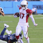 
              Arizona Cardinals wide receiver Andy Isabella (17) does out of bounds a he is chased by Tennessee Titans safety Theo Jackson (29) in the first half of a preseason NFL football game Saturday, Aug. 27, 2022, in Nashville, Tenn. (AP Photo/Mark Zaleski)
            