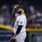 Colorado Rockies relief pitcher Alex Colome pauses on the mound after giving up a two-run single to Arizona Diamondbacks' Geraldo Perdomo during the eighth inning of a baseball game Friday, Aug. 5, 2022, in Phoenix. The Diamondbacks won 6-5. (AP Photo/Ross D. Franklin)