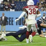 Tennessee Titans quarterback Logan Woodside (5) dives into the end zone to score a touchdown on a 9-yard run against the Arizona Cardinals in the second half of a preseason NFL football game Saturday, Aug. 27, 2022, in Nashville, Tenn. (AP Photo/John Amis)