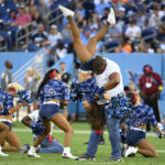Tennessee Titans cheerleaders perform in the first half of a preseason NFL football game between the Titans and the Arizona Cardinals Saturday, Aug. 27, 2022, in Nashville, Tenn. (AP Photo/Mark Zaleski)