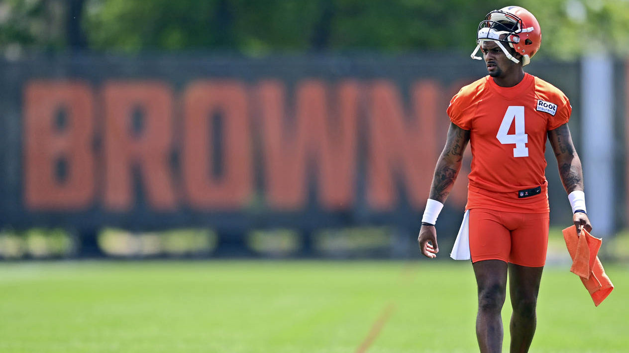 Cleveland Browns quarterback Deshaun Watson walks on the field during training camp in Berea, Ohio,...