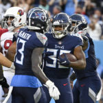 Tennessee Titans running back Julius Chestnut (36) is congratulated by Racey McMath (13) after Chestnut scored a touchdown against the Arizona Cardinals in the first half of a preseason NFL football game Saturday, Aug. 27, 2022, in Nashville, Tenn. (AP Photo/Mark Zaleski)