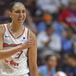 Phoenix Mercury guard Diana Taurasi reacts after throwing the ball out of bounds during the team's WNBA basketball game against the Connecticut Sun on Tuesday, Aug. 2, 2022, in Uncasville, Conn. (Sean D. Elliot/The Day via AP)