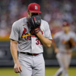 St. Louis Cardinals starting pitcher Miles Mikolas leaves the game during the eighth inning of a baseball game against the Arizona Diamondbacks, Friday, Aug. 19, 2022, in Phoenix. (AP Photo/Matt York)