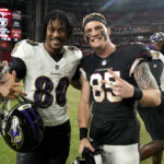 Arizona Cardinals tight end Trey McBride (85) and Baltimore Ravens tight end Isaiah Likely (80) stand for a photo after an NFL preseason football game, Sunday, Aug. 21, 2022, in Glendale, Ariz. The Ravens defeated the Cardinals 24-17. (AP Photo/Rick Scuteri)