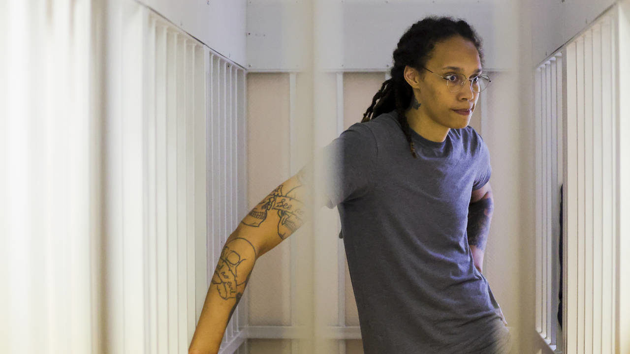 WNBA star and two-time Olympic gold medalist Brittney Griner, stands listening to a verdict in a co...