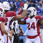 Arizona Cardinals running back Darrel Williams (24) is congratulated after scoring a touchdown against the Tennessee Titans in the first half of a preseason NFL football game Saturday, Aug. 27, 2022, in Nashville, Tenn. (AP Photo/Mark Zaleski)