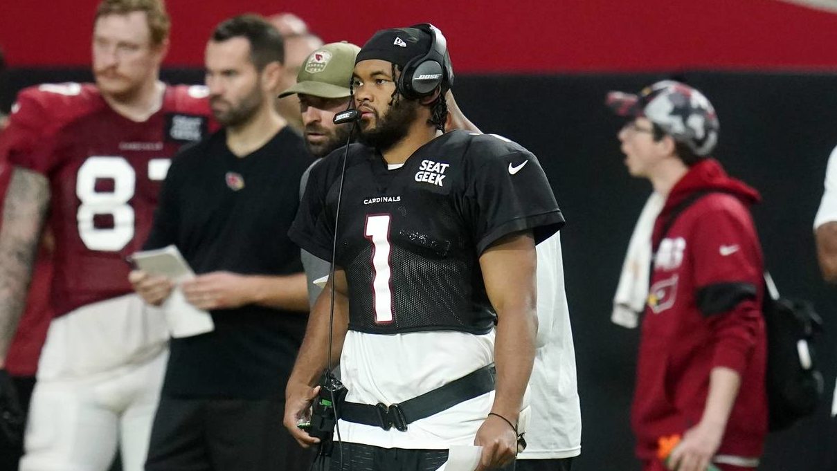 Arizona Cardinals quarterback Kyler Murray takes stands on the sidelines during the NFL football te...