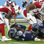 Tennessee Titans running back Julius Chestnut (36) scores a touchdown against the Arizona Cardinals in the first half of a preseason NFL football game Saturday, Aug. 27, 2022, in Nashville, Tenn. (AP Photo/John Amis)