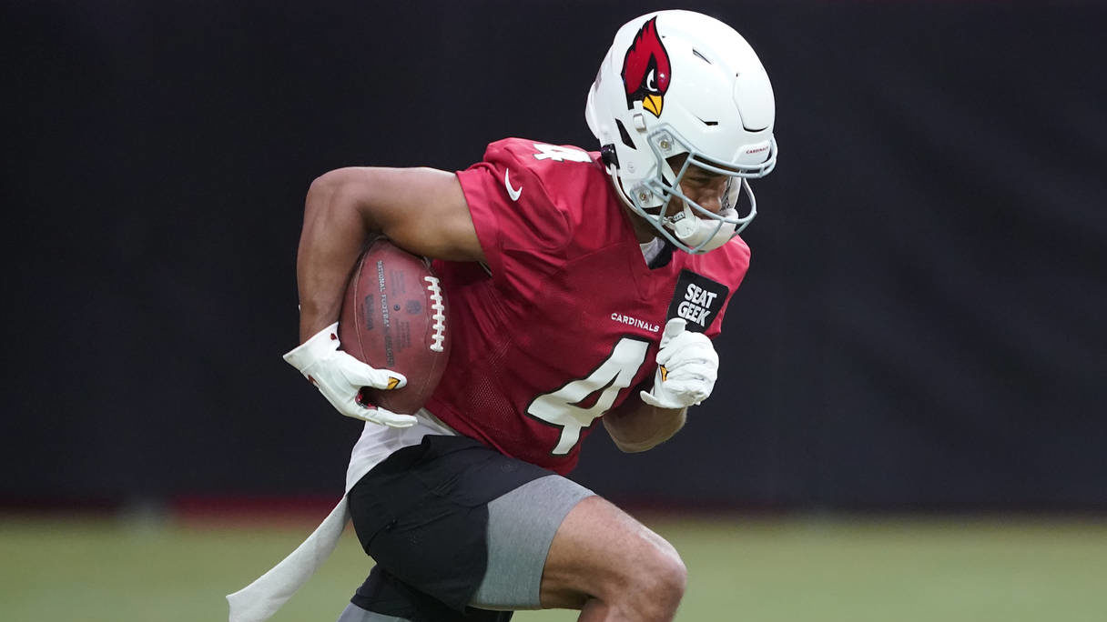 Arizona Cardinals' Rondale Moore runs drills during the NFL football team's training camp at State ...