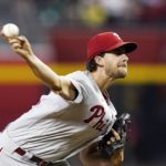 Philadelphia Phillies starting pitcher Aaron Nola throws to an Arizona Diamondbacks batter during the first inning of a baseball game Tuesday, Aug. 30, 2022, in Phoenix. (AP Photo/Ross D. Franklin)