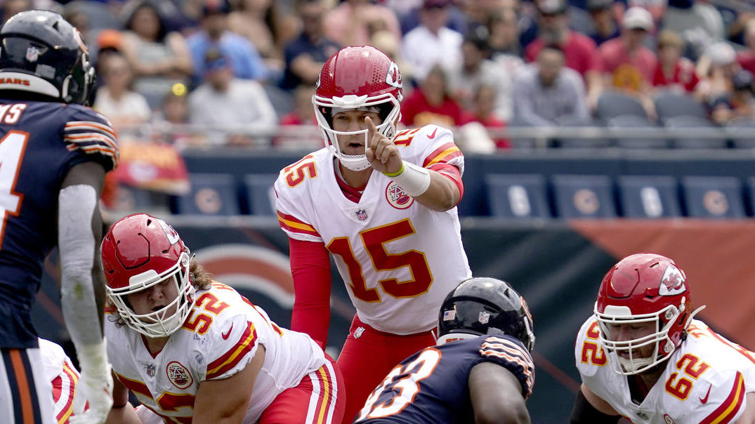 Kansas City Chiefs quarterback Patrick Mahomes points at a defensive player during the first half o...