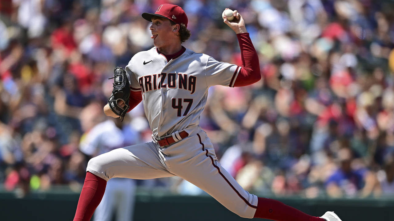 Arizona Diamondbacks starting pitcher Tommy Henry delivers during the third inning of a baseball ga...