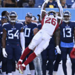 Arizona Cardinals running back Eno Benjamin (26) catches a pass against the Tennessee Titans in the first half of a preseason NFL football game Saturday, Aug. 27, 2022, in Nashville, Tenn. (AP Photo/Mark Zaleski)