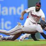 Cleveland Guardians shortstop Amed Rosario tags out Arizona Diamondbacks' Alek Thomas for a double play after Ketel Marte lined out during the fifth inning of a baseball game Tuesday, Aug. 2, 2022, in Cleveland. (AP Photo/David Dermer)