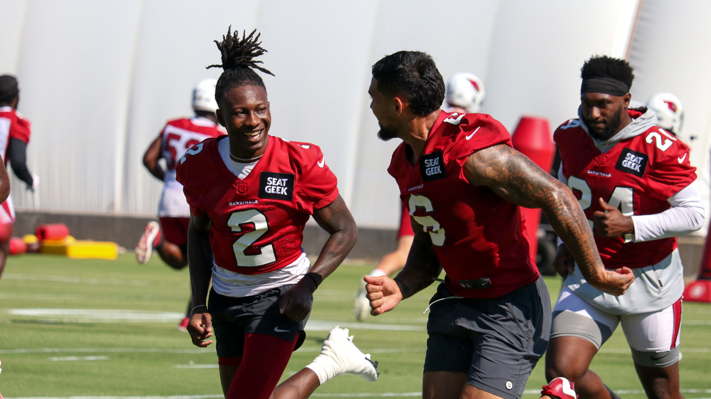 Arizona Cardinals WR Hollywood Brown races RB James Conner ahead of practice on Monday, Sept. 5, 20...