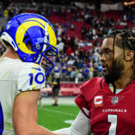 Arizona Cardinals quarterback Kyler Murray meets with Los Angeles Rams receiver Cooper Kupp on the field after Week 3's matchup. (Jeremy Schnell/Arizona Sports)
